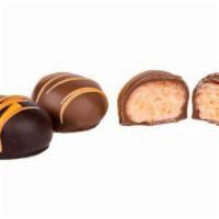 Orange Creams · 1lb Gift Box- Creamy soft center made with real oranges. Dipped in milk or dark chocolate