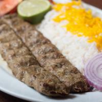 Ground Lamb Kebab · Served with Basmati Rice and  Salad.