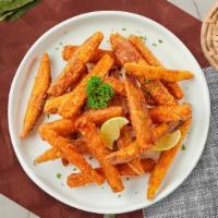 Sweet Potato Fries  · (Vegetarian) Thick-cut sweet potato wedges fried until golden brown