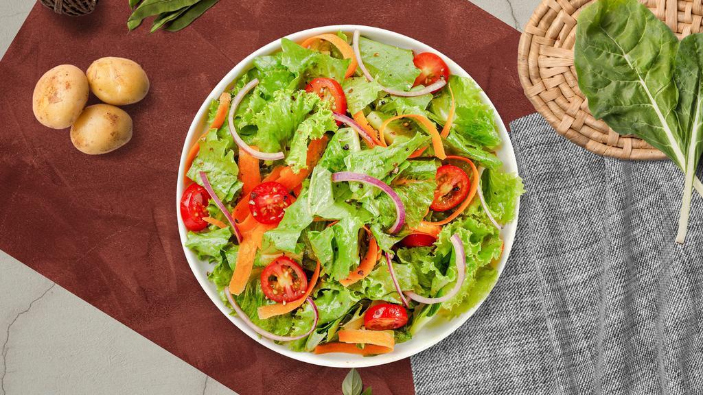 House Salad · (Vegetarian) Romaine lettuce, cherry tomatoes, carrots, and onions dressed tossed with lemon juice & olive oil