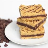 Chocolate Truffle Bar · Generous filling of rich chocolate ganache sandwiched between wholesome sweet oatmeal crumbl...