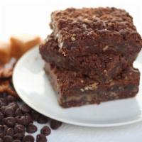 Praline Fudge Bar · Chunky chocolate, soft toffee and dark chocolate in a pecan brownie. Box of twelve bars. Bak...