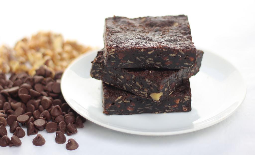 Double Chocolate Walnut Bar · Loaded with an abundance of chopped walnuts mixed with semi-sweet chocolate and extraordinary cocoa powder. Box of twelve bars. Baked in a facility that uses dairy, nuts, and wheat products.