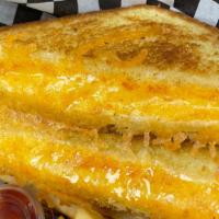 Grilled Cheese With Fries · American & Swiss cheese grilled on wheat or white bread.