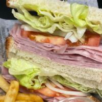 Cold Sandwich With Fries · Ham or Turkey filled with a choice of mayo, tomato, onion, lettuce, avocado on white or whea...