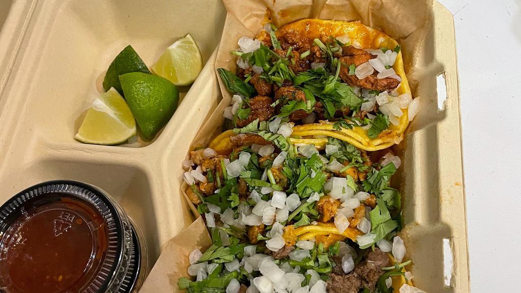 Tacos (4 Tacos / Corn Tortilla)) · Choice of meat , carne asada, pastor pork, carnitas pork or chicken.( Comes w cilantro & onion )