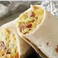 Breakfast Burrito With Fries · Flour tortilla filled with ham, egg, and cheese, accompanied with french fries.