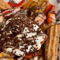 Churro Bites · Mini churros, strawberries ,melted chocolate, condense milk & chocolate sprinkles .Choice st...