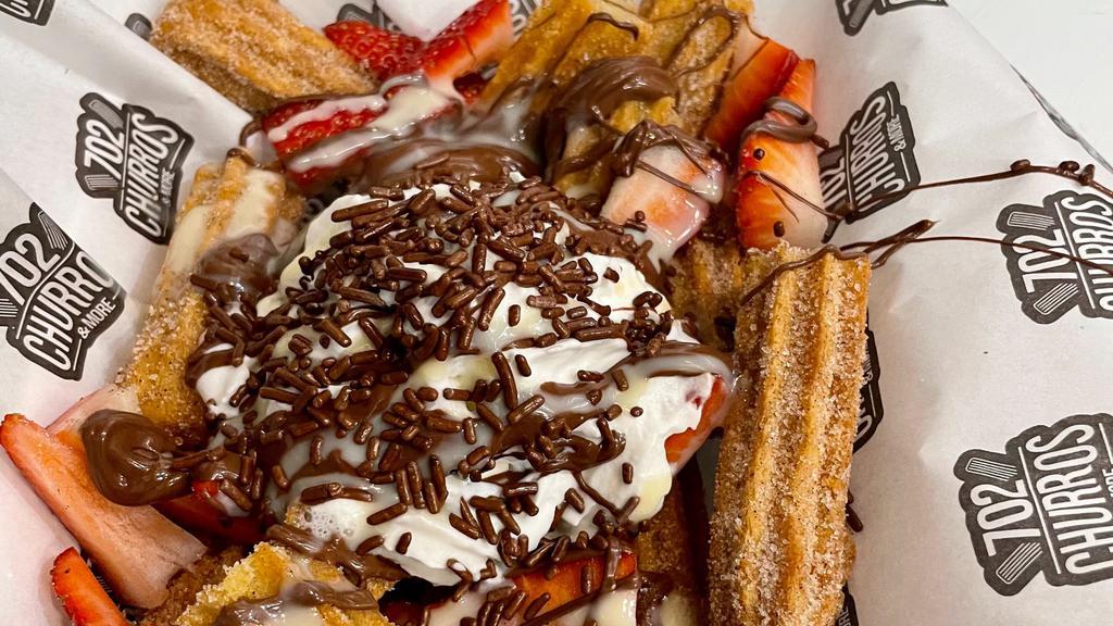 Churro Bites · Mini churros, strawberries ,melted chocolate, condense milk & chocolate sprinkles .Choice strawberries or bananas.