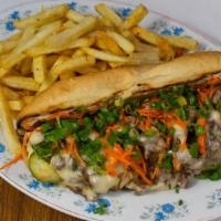 Korean Bbq Philly Cheesesteak · Bulgogi beef, white American cheese, pickled carrots, scallions, and kimchi-mayo on a toaste...