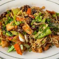 Wok Noodles · Wheat udon noodles, bok choy, edamame, shitake, carrot, celery, and toasted peanuts.