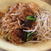 Pad Thai · Rice noodles stir fried with egg, green onions, bean sprouts, with special pad Thai sauce. “...