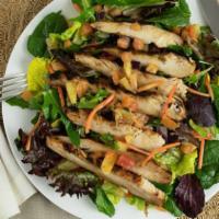 Hawaiian Chicken Salad · Mama's chicken teriyaki served on a bed of mixed greens, napa cabbage, carrots, and pineappl...