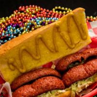 Spicy Cajun Sausage Po Boy · With coleslaw and mustard. 8” served on warm garlic French bread.