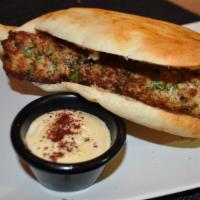 Chicken Kabob · Sandwich with filling that was cooked on a skewer.