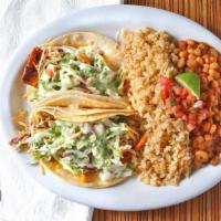 Two Tacos Entree · Your protein choice served with rice & beans.