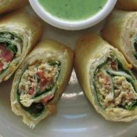 Baja Rolls · Chopped chicken, spinach, pico de gallo and cream cheese wrapped in a flour tortilla and cut...