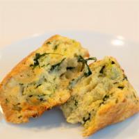 Cheddar And Kale Scone · Savory scone filled with sauteed kale and Beecher's Flagship Cheddar.