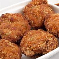 Miniballs · Ground chicken, peas, carrots and onions formed into dumplings that are battered and deep fr...