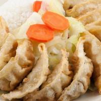 Gyoza Plate · Twelve deep fried pork dumplings served with our special dipping sauce.