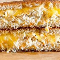 Ultimate Tuna Melt · Albacore tuna salad, gruyere, cheddar & Parmesan cheese grilled to perfection. Choice of bre...