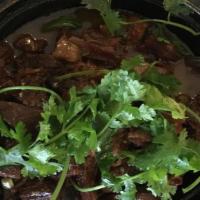 Beef Hot Pot 牛腩煲 · Stewed beef flank with radish or bok choy, topped with cilantro.