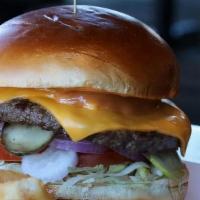 Drive-In Cheeseburger · 1/3 pound patty, american cheese, burger sauce, red onion, tomato, lettuce + pickle
add appl...
