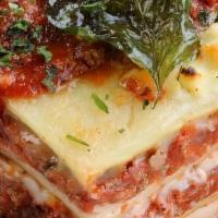 Papa’S Original Lasagna · with italian sausage, ricotta and mama’s meat sauce, mozzarella - oven-baked to a golden brown