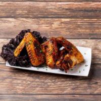 Monkey Wings · Whole chicken wings: who said monkeys can’t fly? Nobody ever! These giant wings are served w...