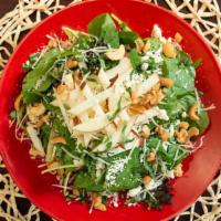 Pear Salad · A mix of spring greens with sliced pear, Gorgonzola, toasted cashews, basil, Romano, and hou...