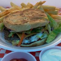 Hamburger · hamburger bread, mayo, hamburger meat, tomatoes, lettuce and onions/ pan de hamburguesa, car...