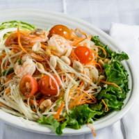 Som Tum · Green papaya, cherry tomatoes, carrots, green beans, shrimps & limes tossed with peanuts, pa...