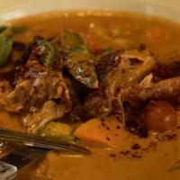 Duck Curry · Medium. Roasted duck, pineapple, tomatoes, red bell peppers and basil cooked in red curry sa...