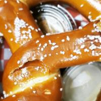 Soft Pretzel · With house spicy mustard & cheese sauce.