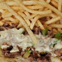 Philly Cheesesteak Sandwich · Roast beef, green and red peppers, onions, white American cheese. Served with choice of hous...