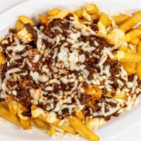 Homemade Chili Cheese Fries · Fried potatoes topped with cheese and chili.