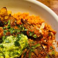Cochinito Bowl · Cinnamon and orange braised pork, cabbage, lime crema, heirloom habanero salsa, pickled onio...