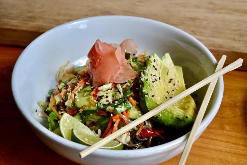 Chilled Soba Noodle Bowl · Chilled Soba Noodles, Green Cabbage, Shredded Carrots, Sliced Cucumbers, Tossed with Cilantro, Green Onion, Sesame and Ponzu Sauce.  Topped with Peanuts, Pickled Ginger and Avocado.