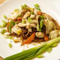 Pancit · Rice noodles with chicken and veggies.