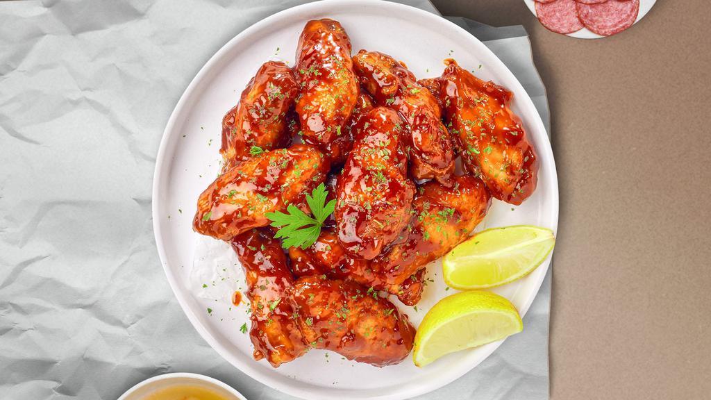 So Hot Honey Wings · Breaded or naked fresh chicken wings, fried until golden brown, and tossed in honey & hot sauce. Served with a side of ranch or bleu cheese.