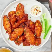 Crispy Classic Wings · Breaded or naked fresh chicken wings until golden brown. Served with a side of ranch or bleu...
