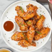 Sweet N’ Spicy Wings (Boneless) · Boneless breaded fresh chicken wings, fried until golden brown, and tossed in sweet and sour...