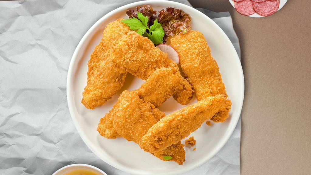 Crispy Chicken Tenders · Chicken tenders breaded and fried until golden brown. Served with your choice of dipping sauce.
