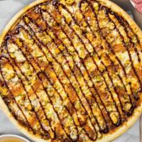 Bbq Boulevard Pizza · Barbecue sauce, juicy chicken, mozzarella, marinara, and chopped garlic baked on a hand-toss...