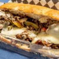 Colorado Philly Cheesesteak · 8 oz. - Seasoned Steak, w/white American cheese, mixed bell peppers & white onions on a toas...