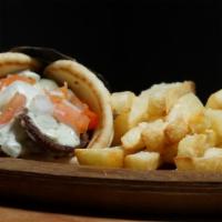Gyro  · Gyro meat, tzatziki sauce, onions, tomato's, served with 1/2 pound fries and fry sauce.