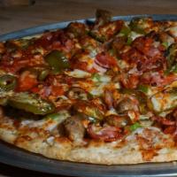 Wild Pepper · Pepperoni, sliced ham, Italian sausage, red peppers, buffalo sauce, jalapeños, green peppers...