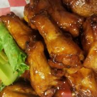 Wings · 10 Wings, carrots, celery, blue cheese or ranch dressing, choice of sauce: Buffalo, Chili Ma...