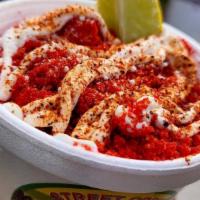 Hot Cheetos Elote In A Cup Or Tray · Sweet white corn, hot Cheetos, mayonnaise, cotija cheese, tajin, crema, lime wedge.