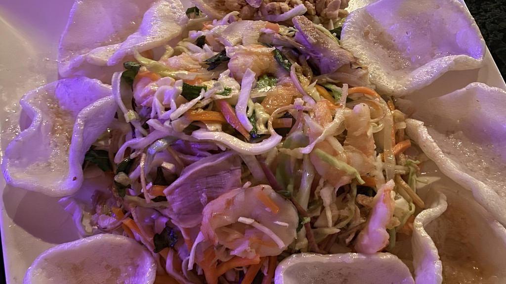 Gỏi Tôm Thịt - Shrimp Pork Salad · This delicious salad comes with fresh, flavorful veggies such as cabbage, carrots, onions, shallot, cucumber, steamed shrimps, and thinly sliced pork.